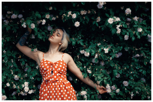 Woman lost in roses