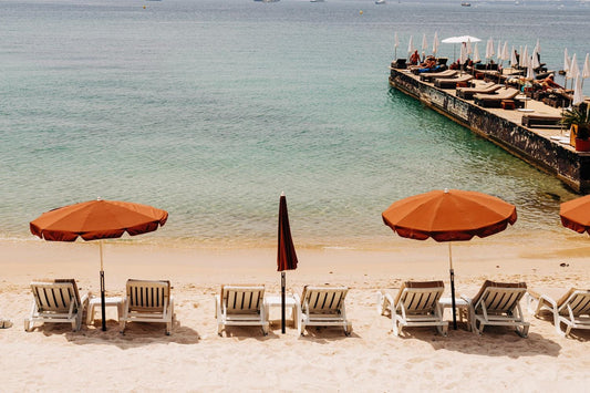 French Riviera Print of Juan-les-Pins Beach with Orange Umbrellas